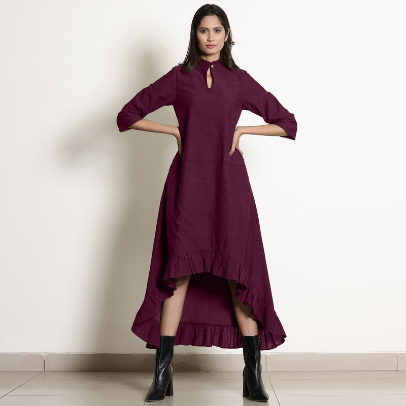 Front View of a Model wearing Warm Berry Wine Frilled Neck High Low Dress