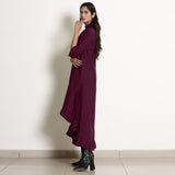 Left View of a Model wearing Warm Berry Wine Frilled Neck High Low Dress