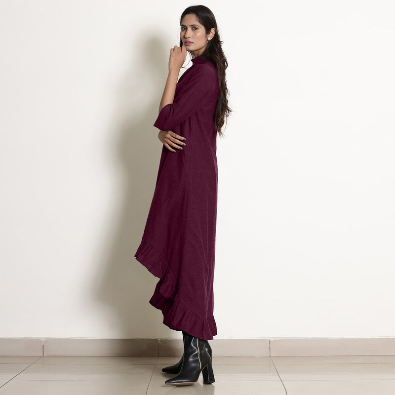 Left View of a Model wearing Warm Berry Wine Frilled Neck High Low Dress