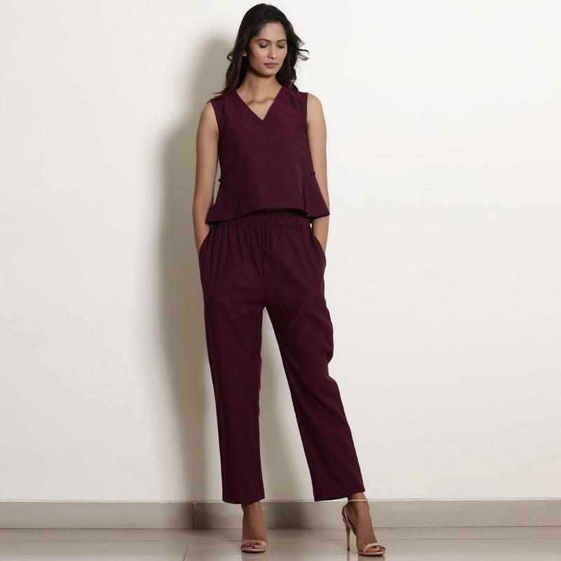 Front View of a Model wearing Warm Berry Wine Frilled V-Neck Top and Pant Set
