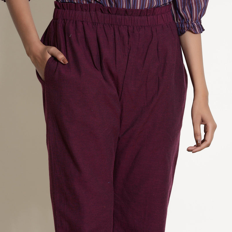Front Detail of a Model wearing Warm Berry Wine Frilled Waist Tapered Pant