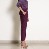 Right View of a Model wearing Solid Berry Wine Warm Cotton Tapered Pant