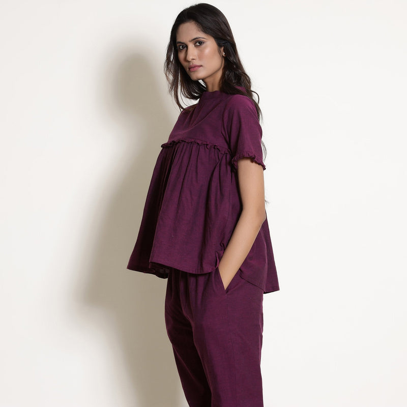 Left View of a Model wearing Berry Wine Warm Cotton Frilled Gathered Top