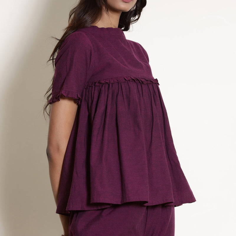 Front Detail of a Model wearing Berry Wine Warm Cotton Frilled Gathered Top
