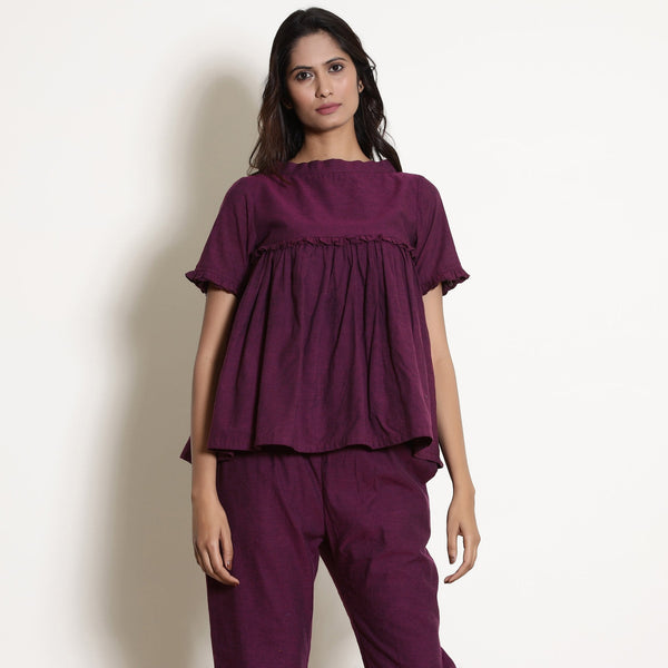 Front View of a Model wearing Berry Wine Warm Cotton Frilled Gathered Top