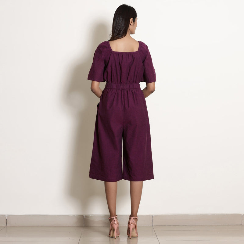 Back View of a Model wearing Berry Wine Warm Cotton Knee Length Flared Jumpsuit