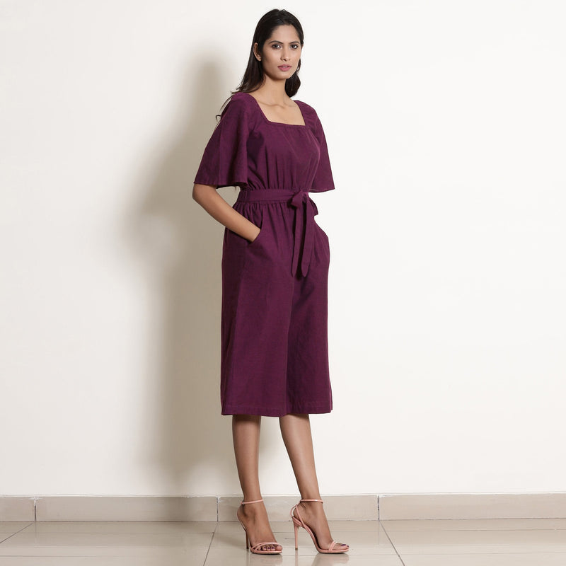 Right View of a Model wearing Berry Wine Warm Cotton Knee Length Flared Jumpsuit