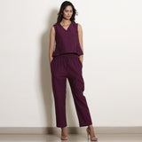 Front View of a Model wearing Berry Wine Warm Cotton Sleeveless Frilled Godet Top