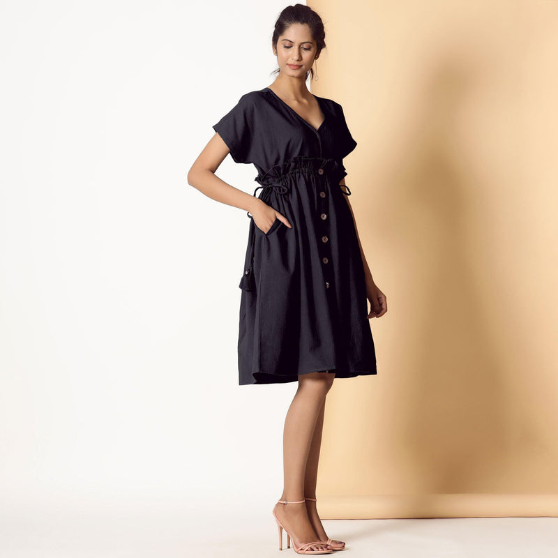 Right View of a Model wearing Black Warm Cotton Flannel Knee Length Frilled Dress