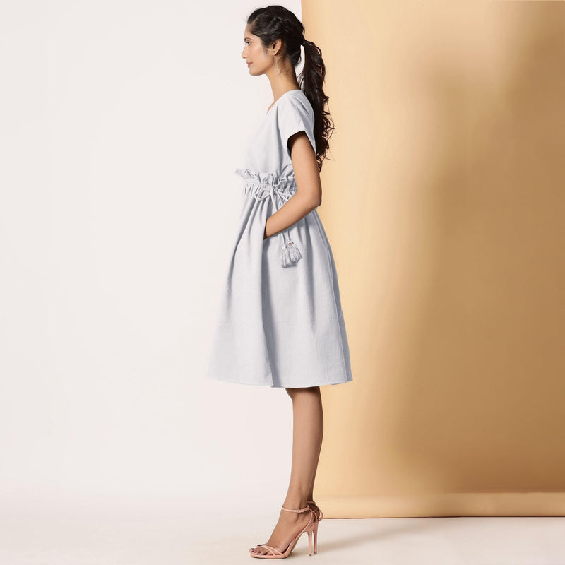 Left View of a Model wearing Cloudy Grey Warm Cotton Flannel Knee Length Frilled Dress