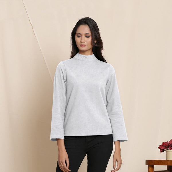 Front View of a Model wearing Warm Cloudy Grey Turtleneck Straight Top