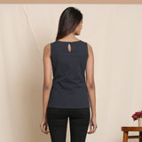 Back View of a Model wearing Moonlight Black Warm Cotton Flannel Sleeveless Tie-up Top