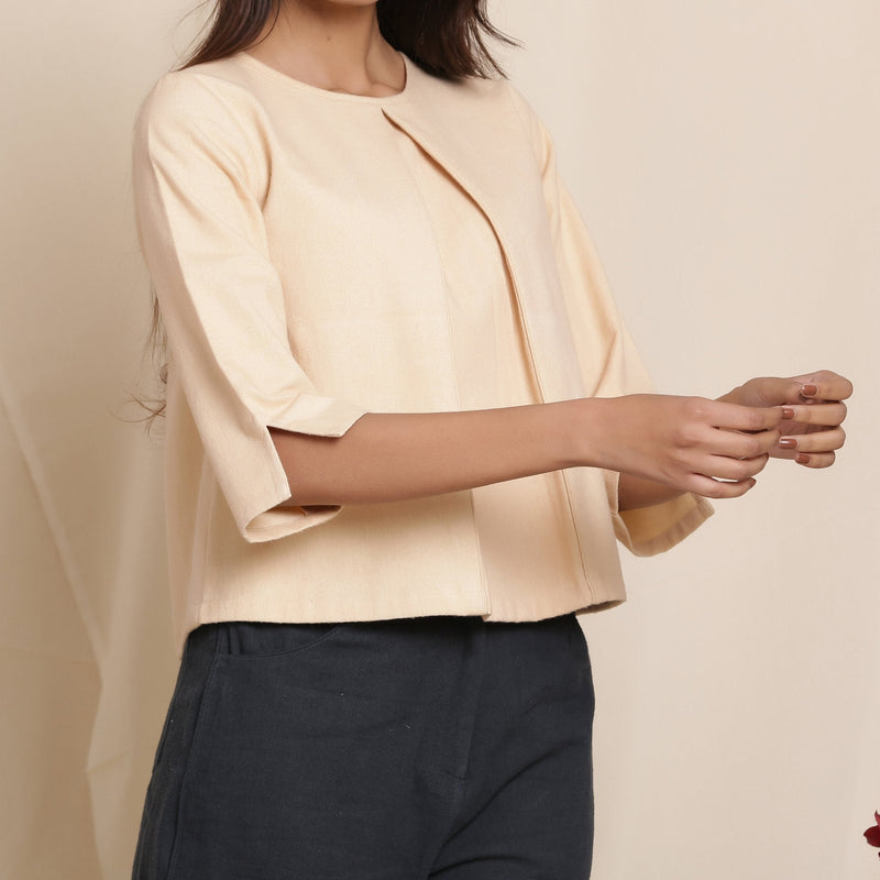 Front Detail of a Model wearing Dusk Beige Warm Cotton Flannel Box-Pleat Top