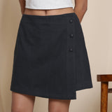 Front Detail of a Model wearing Warm Flannel Moonlight Black Overlap Skirt