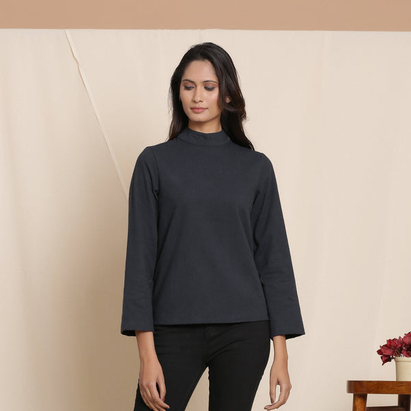 Front View of a Model wearing Moonlight Black Warm Cotton Flannel High Neck Top