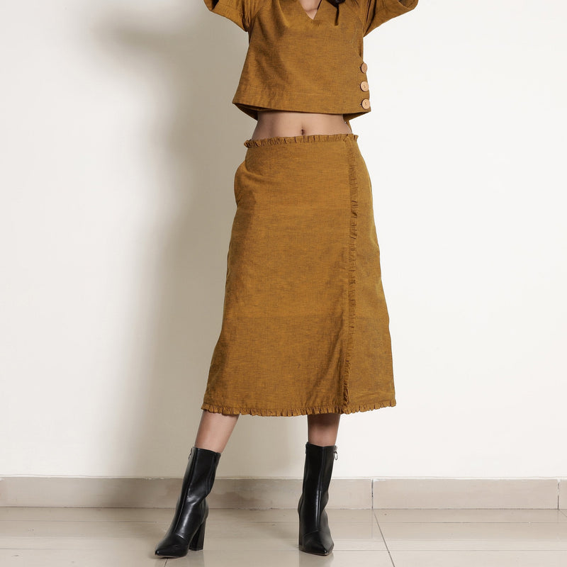 Front View of a Model wearing Golden Oak Warm Cotton Frilled Midi Skirt