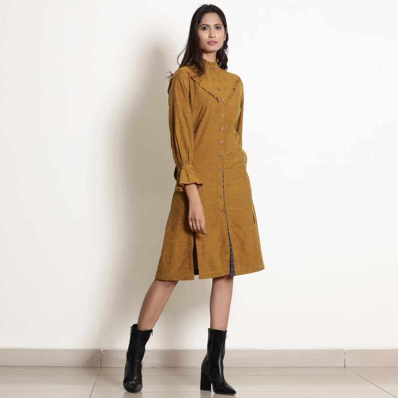Right View of a Model wearing Golden Oak Warm Cotton Frilled Knee Length Dress