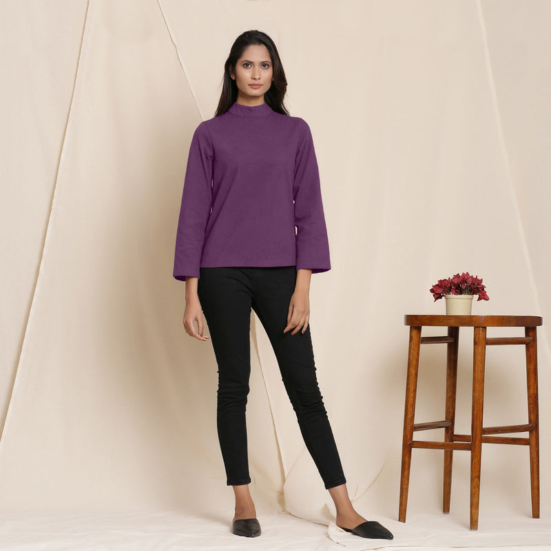 Front View of a Model wearing Warm Grape Wine Turtleneck Straight Top