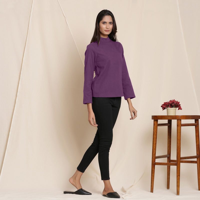 Right View of a Model wearing Warm Grape Wine Turtleneck Straight Top