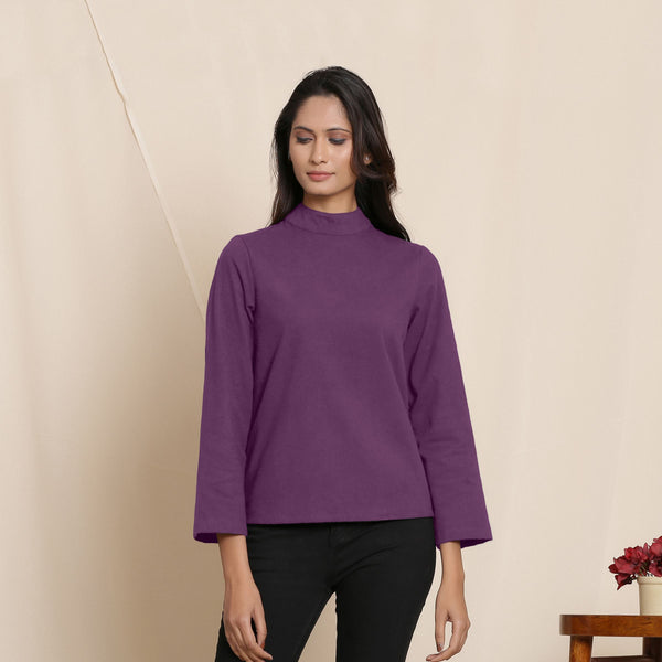 Front View of a Model wearing Warm Grape Wine Turtleneck Straight Top