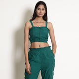 Front View of a Model wearing Warm Green Frilled Crop Bustier Top