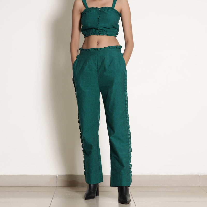 Front Detail of a Model wearing Warm Green Frilled Bustier Top and Pant Set