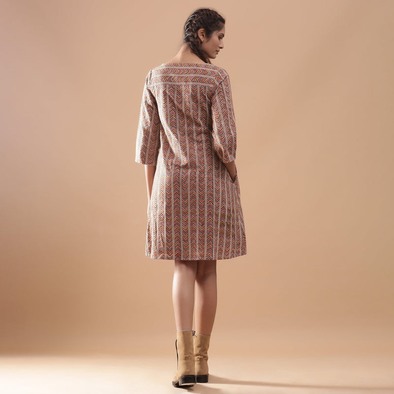 Back View of a Model wearing Warm Kalamkari Block Print Knee Length Cotton Dress