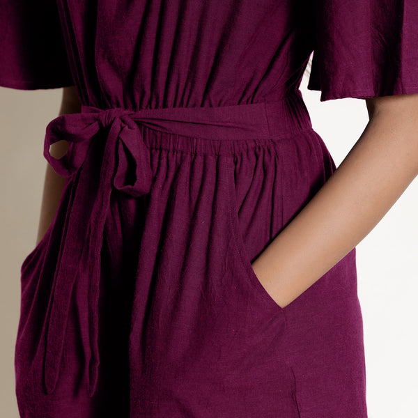 Front Detail of a Model wearing Warm Mulberry Loose Fit Cotton Jumpsuit
