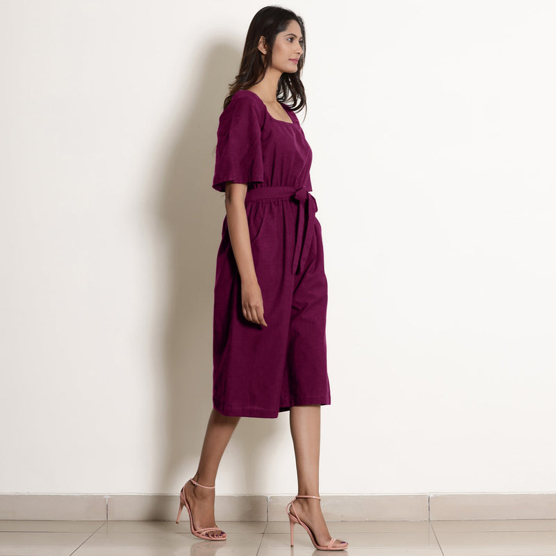 Right View of a Model wearing Warm Mulberry Loose Fit Cotton Jumpsuit