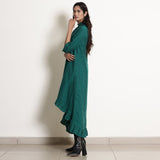Left View of a Model wearing Warm Pine Green Frilled Neck High Low Dress