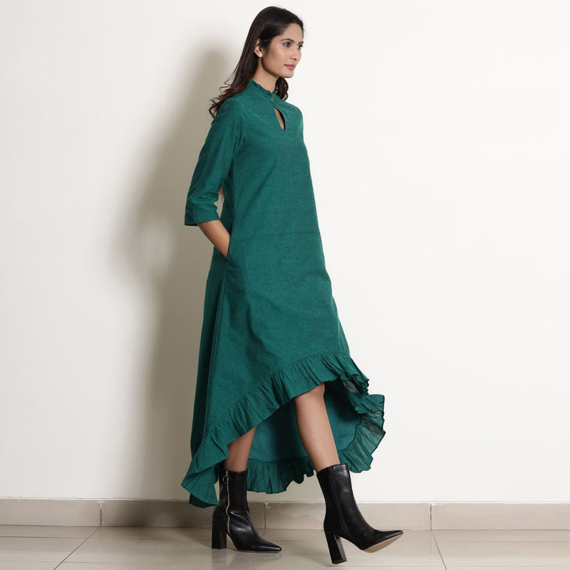 Right View of a Model wearing Pine Green Warm Cotton Frilled Neck Ankle Length Dress