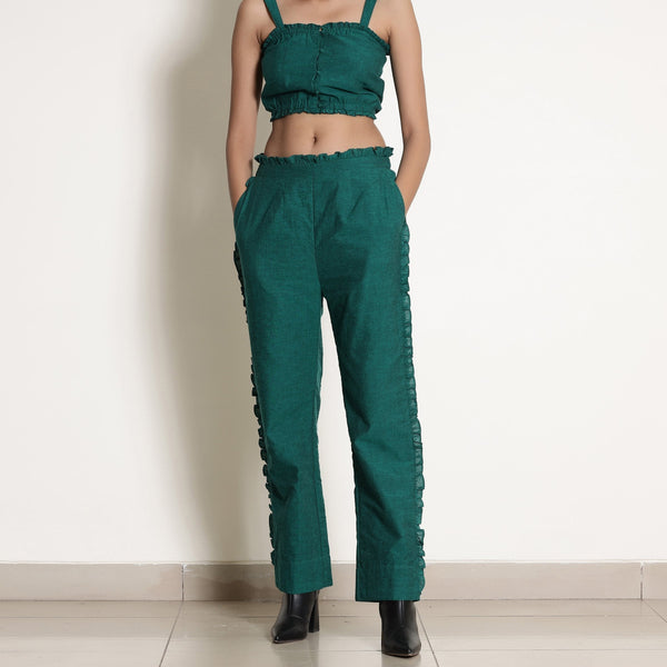 Front View of a Model wearing Pine Green Frill Warm Cotton Mid-Rise Paperbag Pant