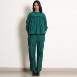 Front View of a Model wearing Warm Pine Green Frilled Top and Pant Set