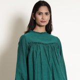 Front Detail of a Model wearing Warm Green Frilled Gathered Yoked Top