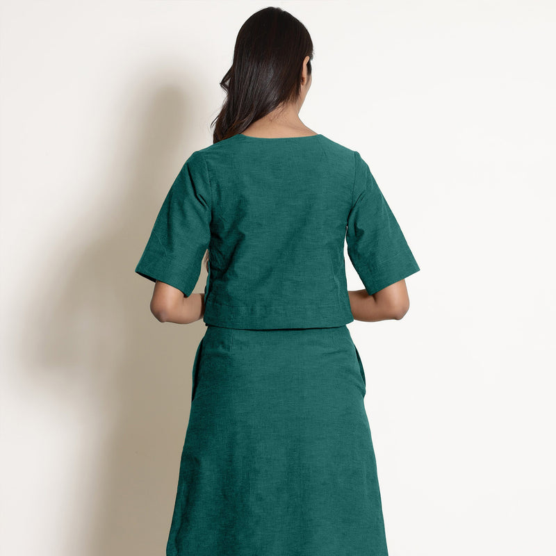 Back View of a Model wearing Warm Pine Green V-Neck Wrap Top