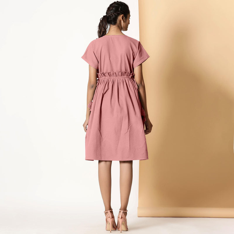 Back View of a Model wearing Powder Pink Warm Cotton Flannel Knee Length Frilled Dress