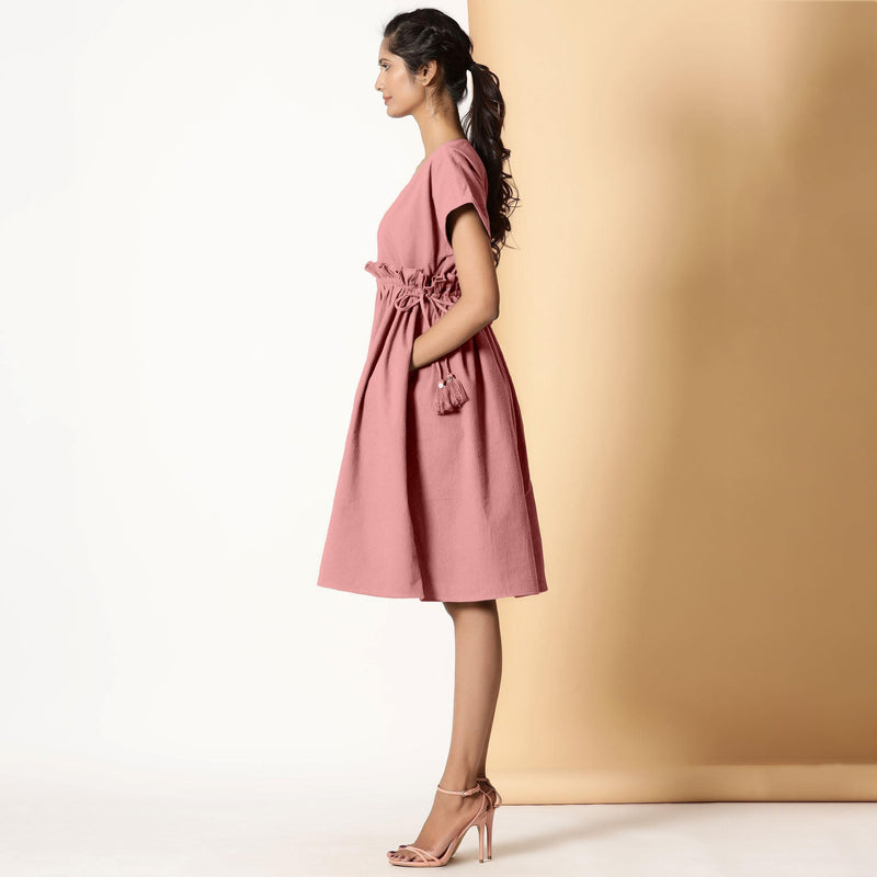 Left View of a Model wearing Powder Pink Warm Cotton Flannel Knee Length Frilled Dress