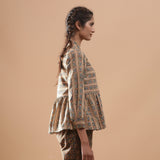 Right View of a Model wearing Beige Floral Warm Block Print Cotton Shirt