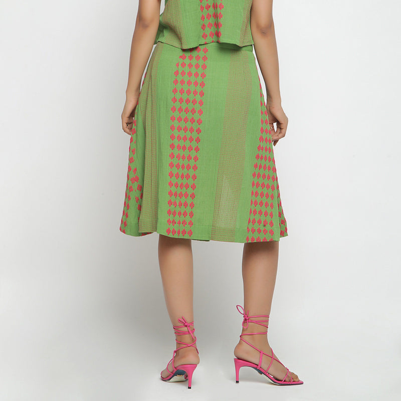 Back View of a Model wearing Green Crinkled Cotton Geometric A-Line Skirt