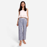 Front View of a Model wearing White and Blue Checks Block Print Ankle Length Cotton Pant