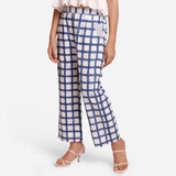 Left View of a Model wearing White and Blue Checks Block Print Ankle Length Cotton Pant
