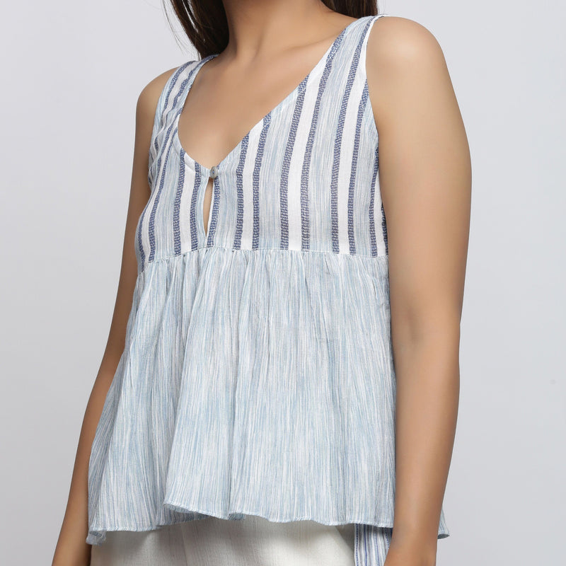 Front Detail of a Model wearing White and Blue Yarn Dyed Gathered Top