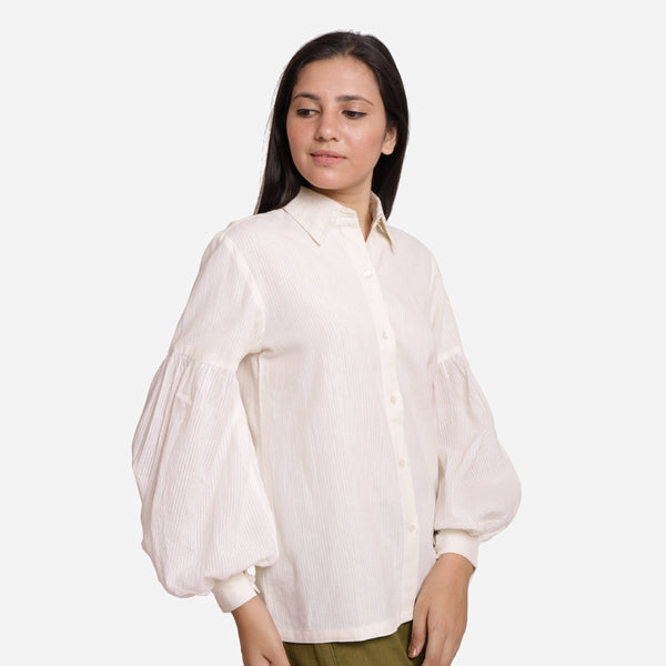Right View of a Model wearing White Bishop Sleeve Cotton Shirt