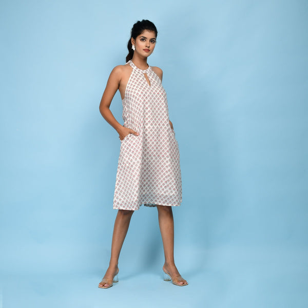 Right View of a Model wearing White Block Printed Cotton Knee Length Dress
