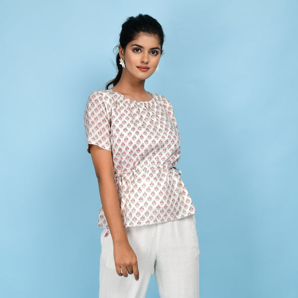 Right View of a Model wearing White Floral Block Printed Cotton A-Line Top