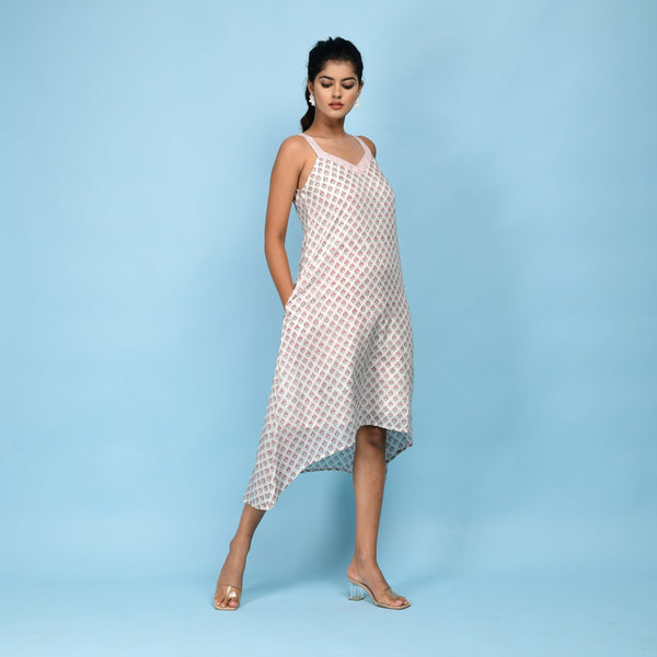 Right View of a Model wearing White Block Printed High-Low Cotton Midi Dress