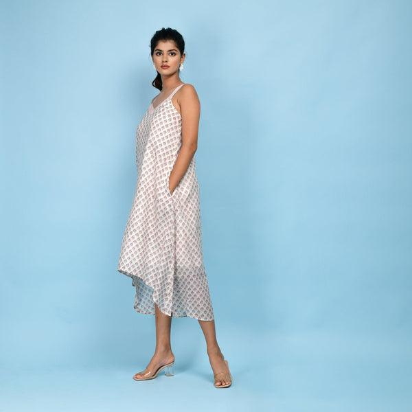 Left View of a Model wearing White Block Printed High-Low Cotton Midi Dress