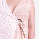 Front Detail of a Model wearing White Sanganeri Block Printed Cotton Sleeveless Wrap Top
