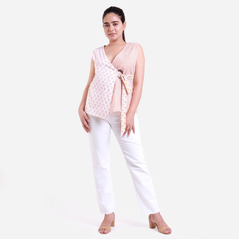 Front View of a Model wearing White Sanganeri Block Printed Cotton Sleeveless Wrap Top