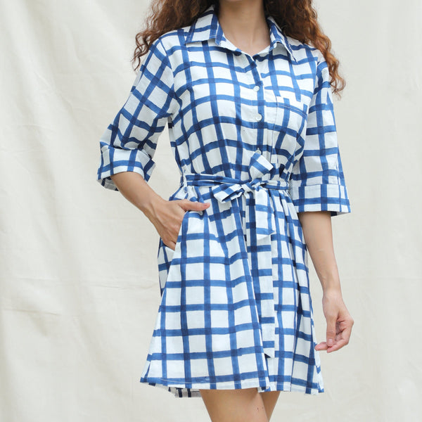 Front Detail of a Model wearing White and Blue Block Print Cotton Short Button-Down Shirt Dress